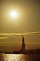 The Statue of Liberty from the east, embellished by golden sunset in late December 2002.